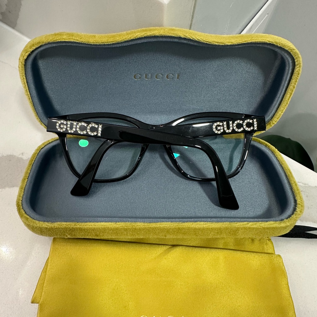 Gucci Women's Black Glasses With Yellow Case